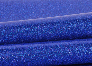 Porcellana Tessuto blu con il fondo del panno, tessuto speciale di scintillio del PVC di scintillio della scintilla del cuoio del tessuto fabbrica
